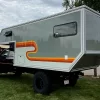 Globe Trekker Expedition Cabover Camper with wrap.